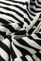 Black and white oversized striped Henley hooded top by Dear-Lover with dolman sleeves, buttons, and long sleeve design.