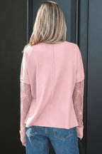 Light pink long sleeve tee by Dear-Lover with textured patchwork and bow details, made of polyester and elastane fabric.