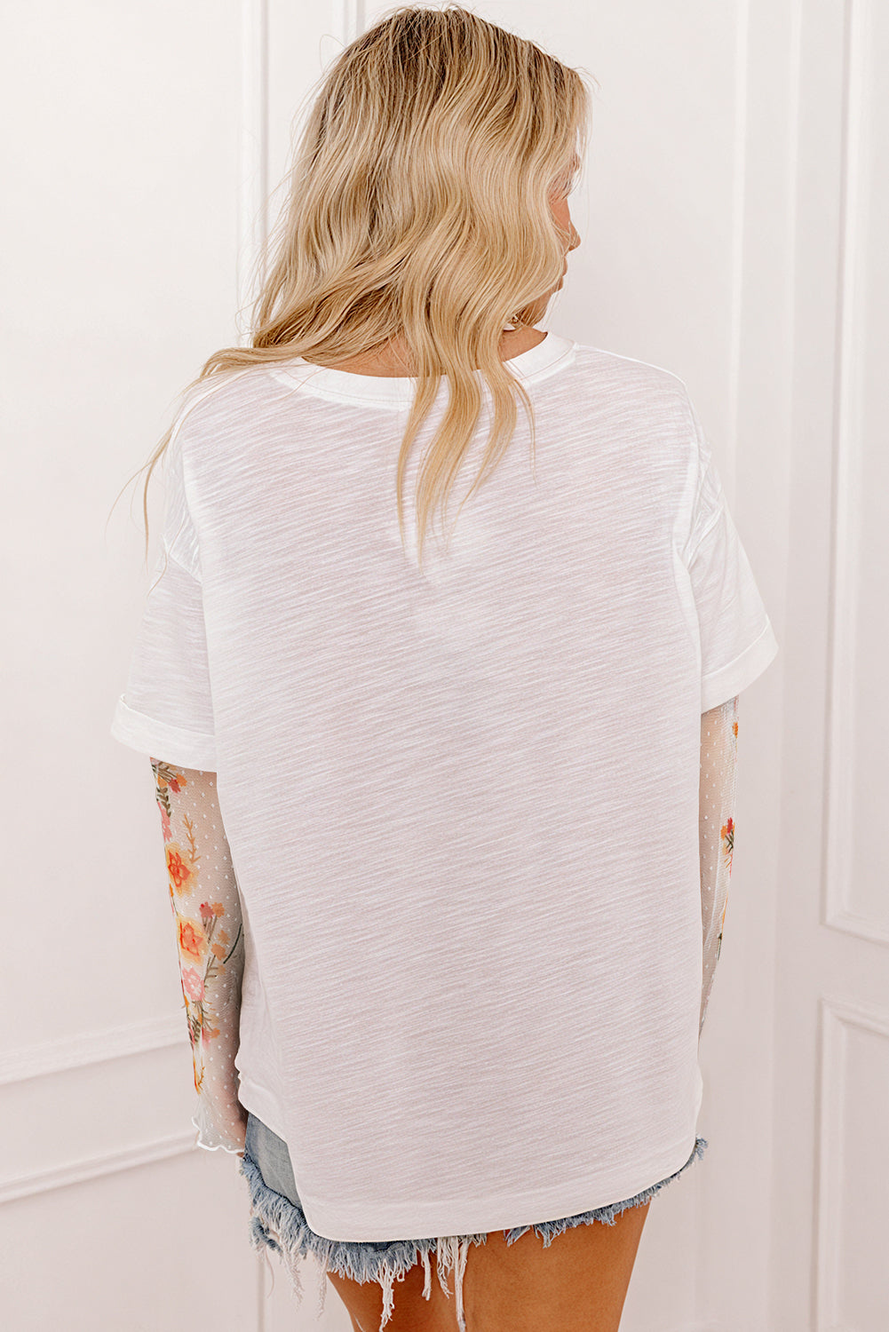 Faux two-piece floral long sleeve patchwork tee from Dear-Lover, featuring white fabric, long sleeves, and stylish floral design.