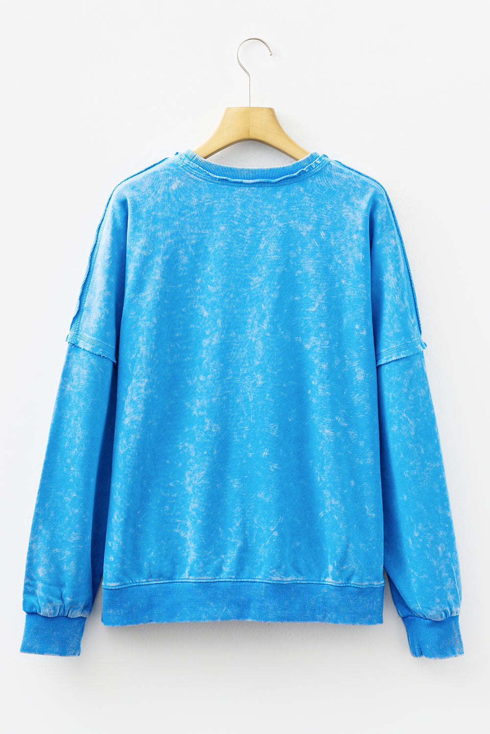 Blue mineral wash Dear-Lover sweatshirt with raw seams and double patched pockets, made of cotton-polyester blend, casual pullover top.