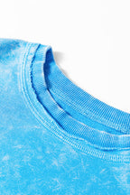 Blue mineral wash Dear-Lover sweatshirt with raw seams, double patched pockets, and a pullover design, made of cotton-polyester blend.