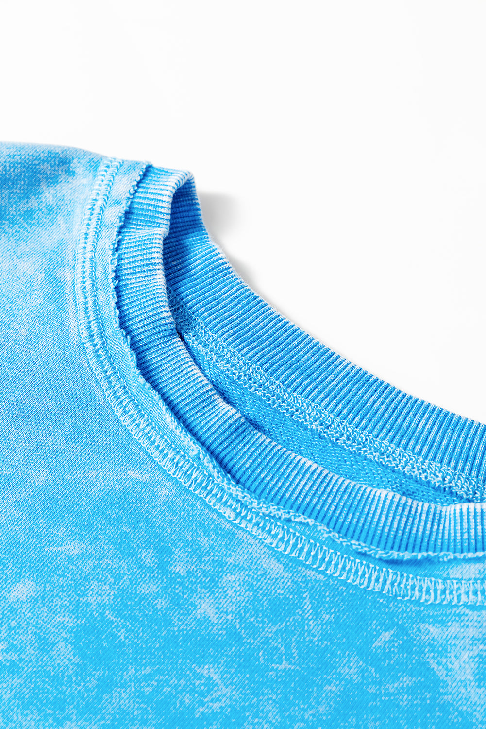 Blue mineral wash Dear-Lover sweatshirt with raw seams, double patched pockets, and a pullover design, made of cotton-polyester blend.