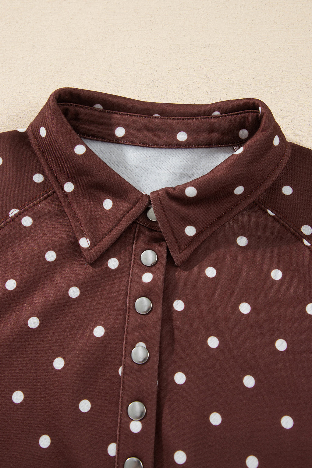 Brown polka dot print casual sweatshirt with metal button collar, made by Dear-Lover, featuring a pullover style and comfortable polyester fabric.