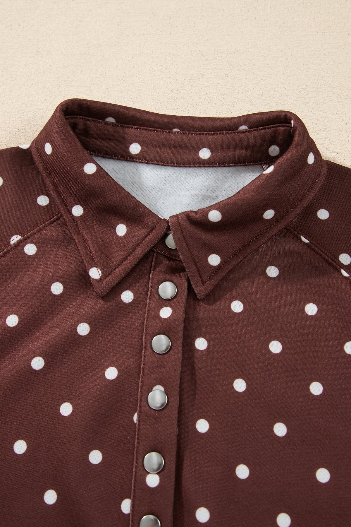 Brown polka dot print casual sweatshirt with metal button collar, made by Dear-Lover, featuring a pullover style and comfortable polyester fabric.
