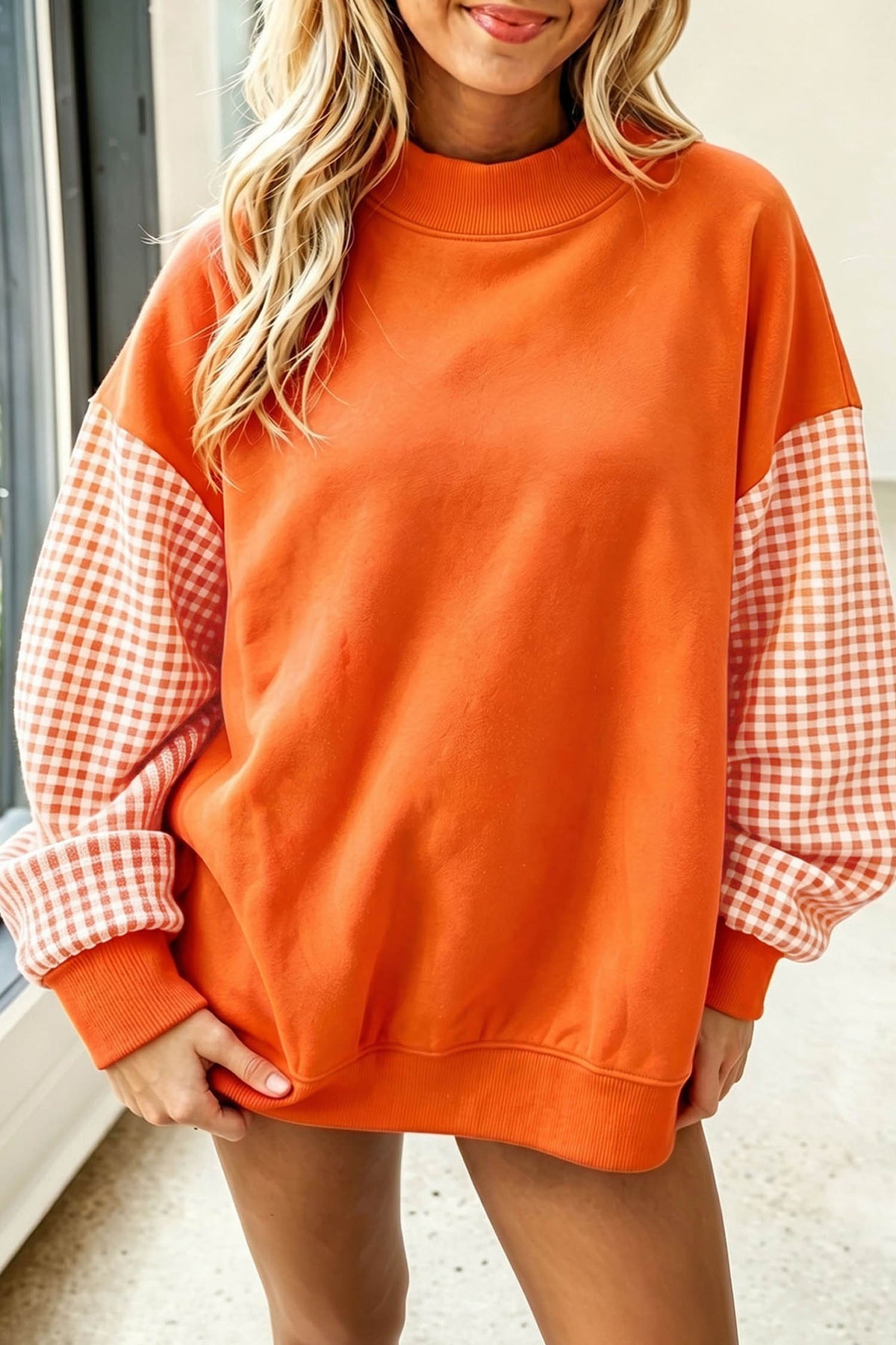 Dear-Lover plaid sleeve loose tunic sweatshirt with colorblock design, featuring a relaxed fit and cozy fabric in green tones.