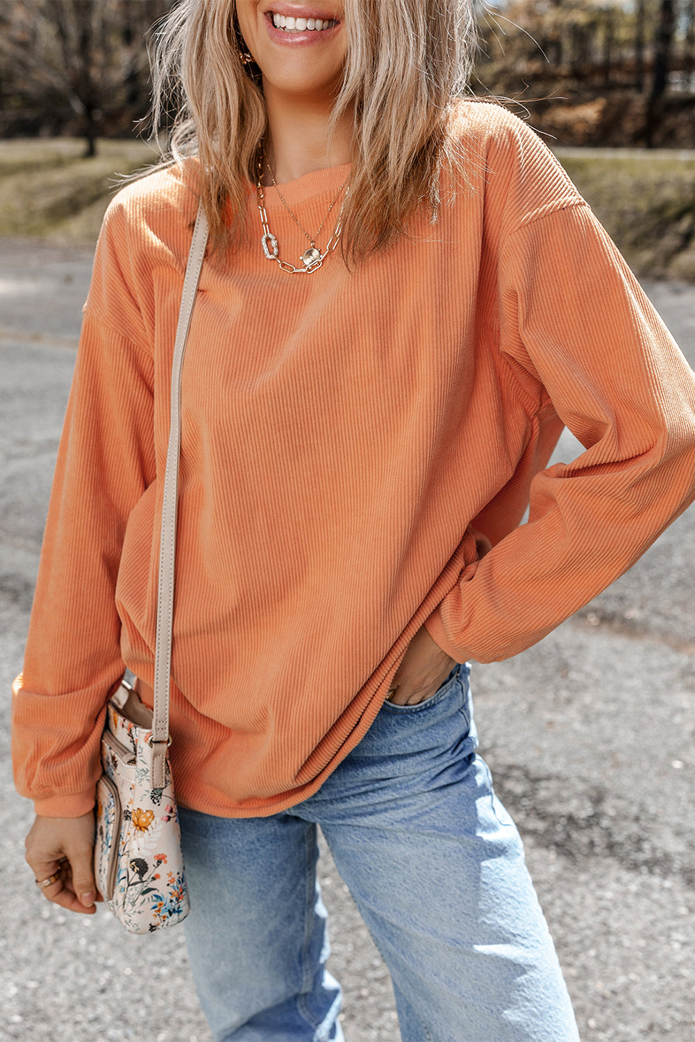 Orange ribbed corduroy oversized sweatshirt by Dear-Lover Dropshipping, featuring a cozy, textured fabric and relaxed fit.