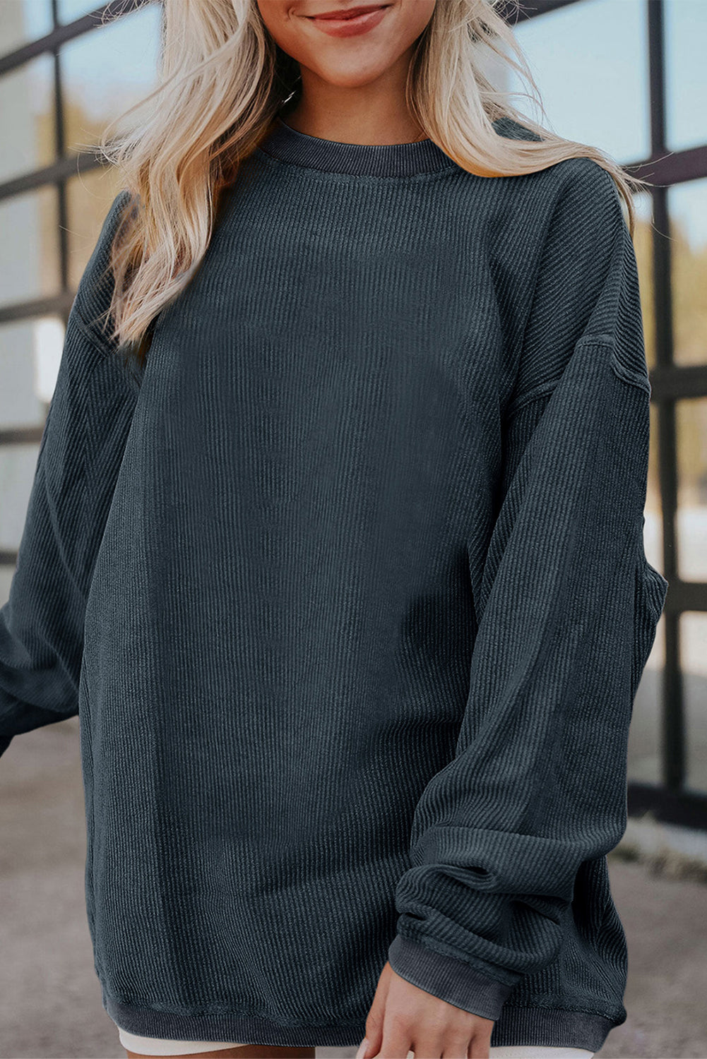 Orange ribbed corduroy oversized sweatshirt by Dear-Lover Dropshipping, featuring a cozy, textured fabric and relaxed fit.