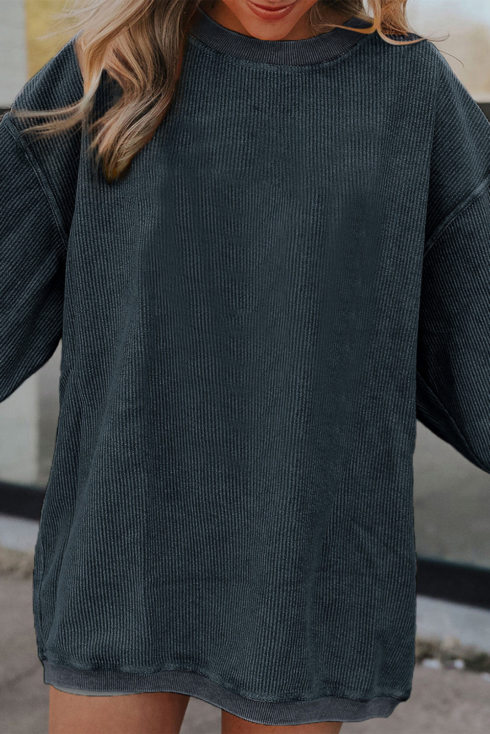 Orange ribbed corduroy oversized sweatshirt from Dear-Lover Dropshipping, showing the textured fabric and relaxed fit.