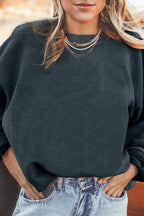 Orange ribbed corduroy oversized sweatshirt by Dear-Lover Dropshipping, featuring a cozy, textured fabric and relaxed fit.