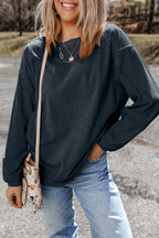 Orange ribbed corduroy oversized sweatshirt by Dear-Lover, featuring a cozy, relaxed fit and textured fabric detail.