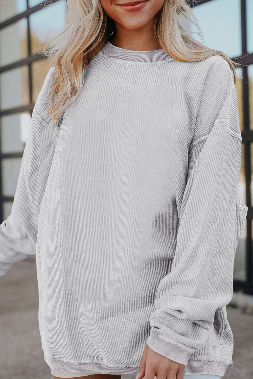 Orange ribbed corduroy oversized sweatshirt by Dear-Lover Dropshipping, featuring a cozy, relaxed fit and textured fabric.