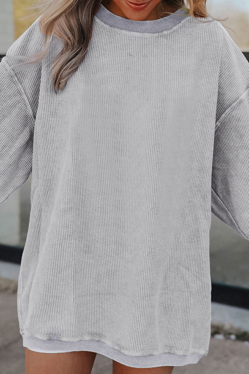 Orange ribbed corduroy oversized sweatshirt from Dear-Lover Dropshipping, featuring a relaxed fit and textured fabric.