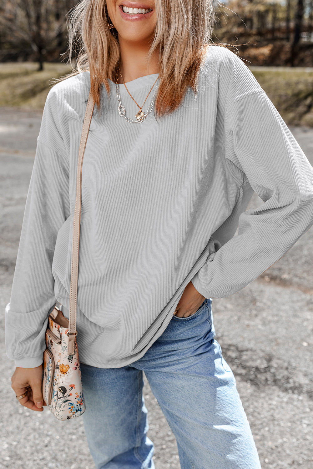 Orange ribbed corduroy oversized sweatshirt from Dear-Lover Dropshipping, featuring a cozy, textured fabric and relaxed fit.