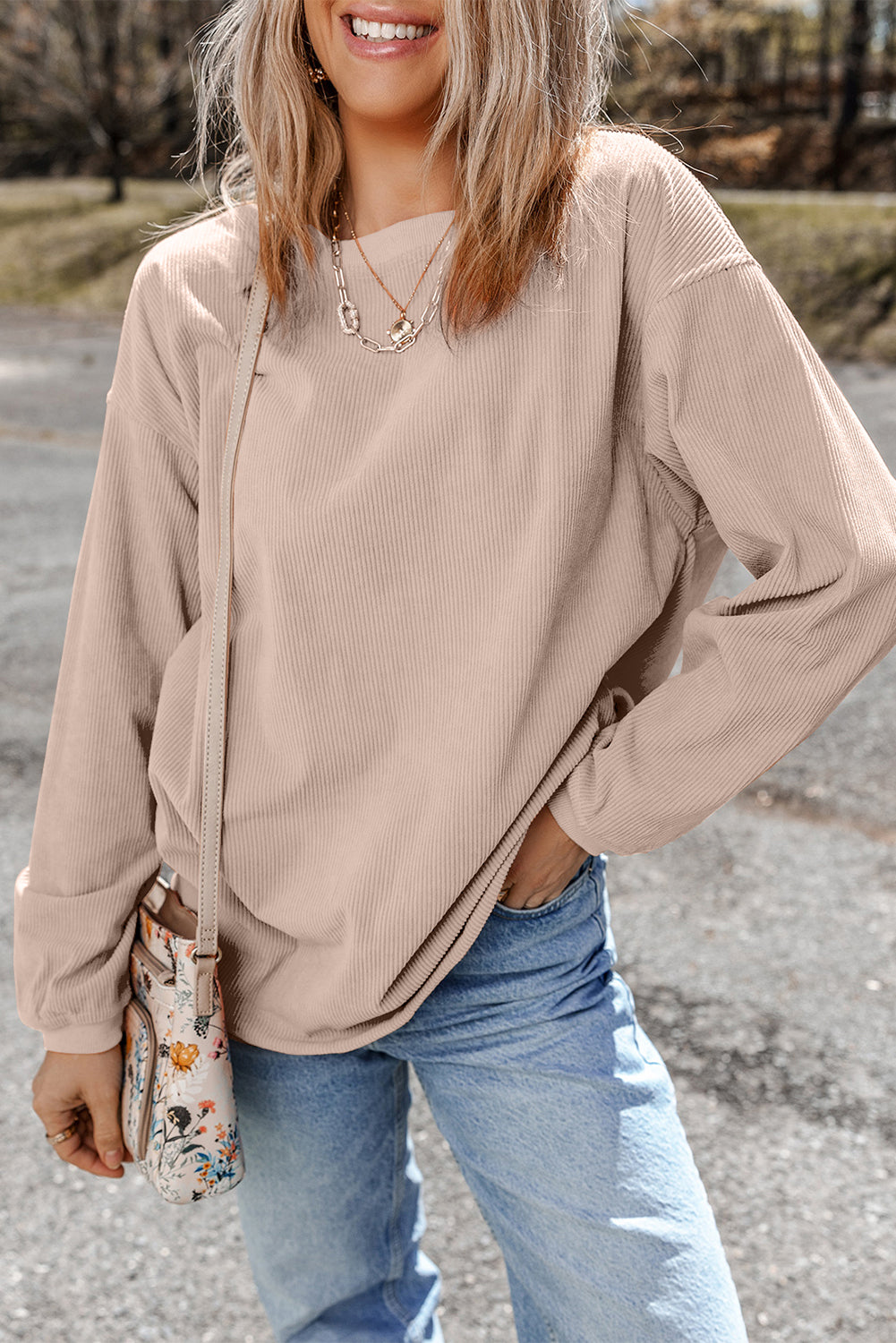 Orange ribbed corduroy oversized sweatshirt from Dear-Lover Dropshipping, featuring a cozy, relaxed fit and textured fabric.