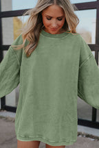 Orange ribbed corduroy oversized sweatshirt by Dear-Lover Dropshipping, featuring a cozy, relaxed fit and textured fabric.