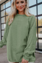 Orange ribbed corduroy oversized sweatshirt from Dear-Lover, featuring a relaxed fit and cozy, textured fabric.