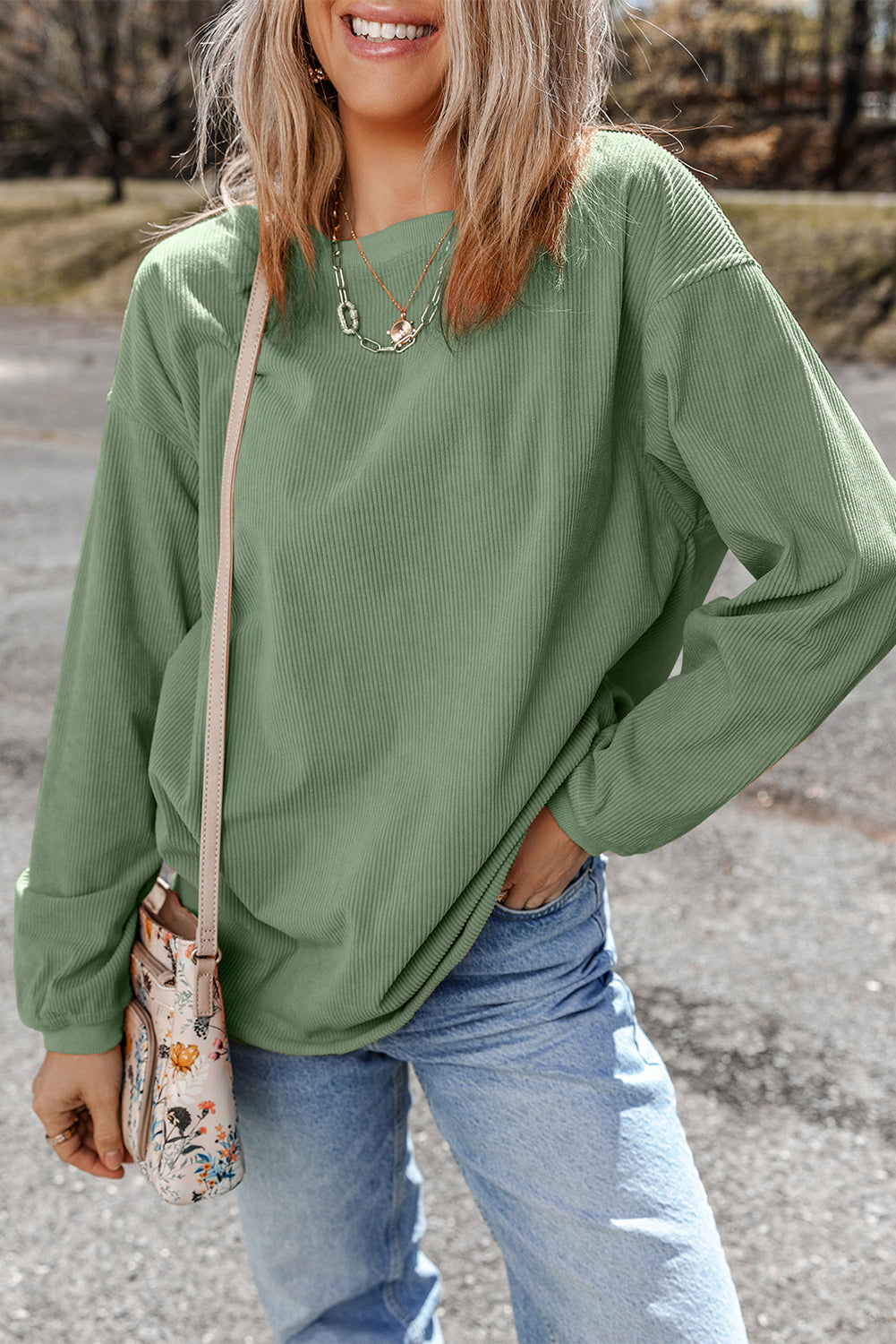 Orange ribbed corduroy oversized sweatshirt from Dear-Lover Dropshipping, featuring a cozy, relaxed fit and textured fabric.