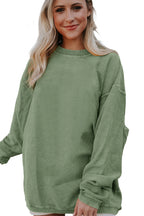 Orange ribbed corduroy oversized sweatshirt by Dear-Lover Dropshipping, showing the textured fabric and relaxed fit.