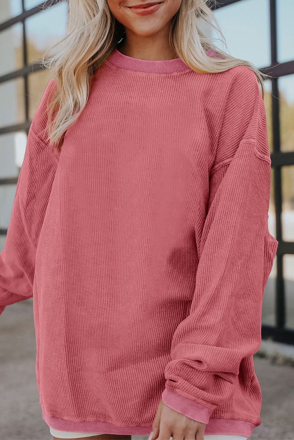 Orange ribbed corduroy oversized sweatshirt from Dear-Lover Dropshipping, featuring a cozy, textured fabric and relaxed fit.