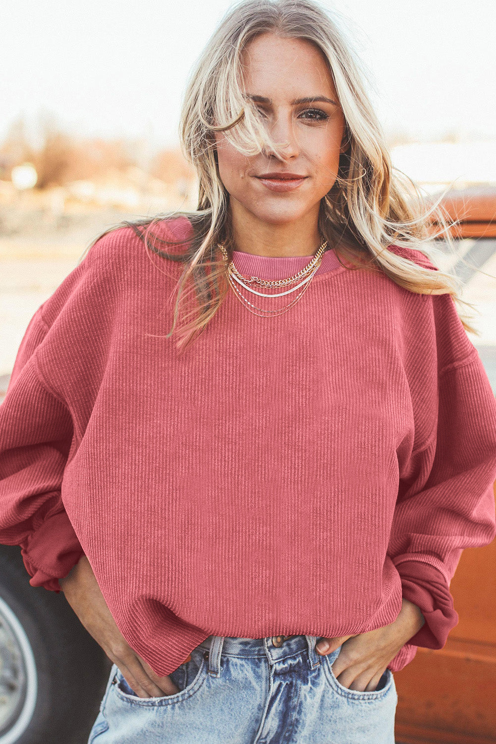 Orange ribbed corduroy oversized sweatshirt by Dear-Lover Dropshipping, featuring a cozy, textured fabric and relaxed fit.