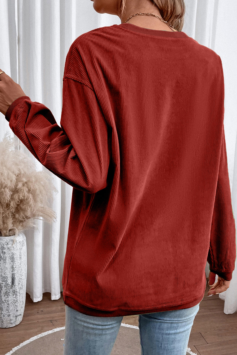 Orange ribbed corduroy oversized sweatshirt from Dear-Lover Dropshipping, featuring a cozy, relaxed fit and textured fabric.