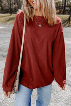 Orange ribbed corduroy oversized sweatshirt by Dear-Lover Dropshipping, featuring a relaxed fit and textured fabric.
