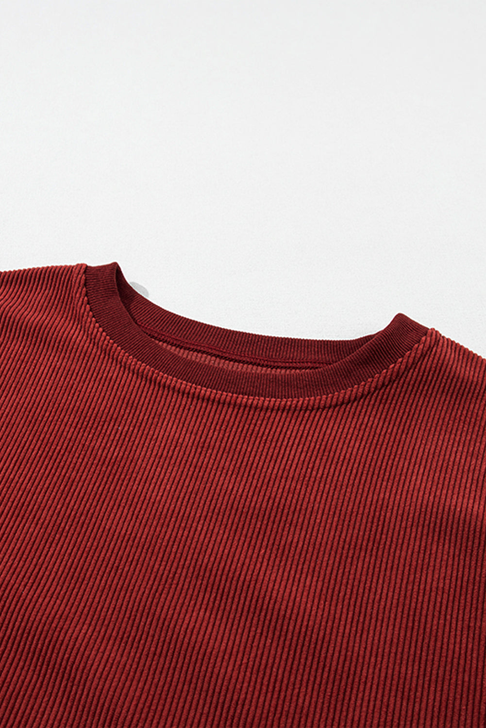 Orange ribbed corduroy oversized sweatshirt by Dear-Lover, featuring a cozy, textured fabric and relaxed fit.