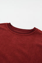 Orange ribbed corduroy oversized sweatshirt by Dear-Lover, featuring a cozy, textured fabric and relaxed fit.