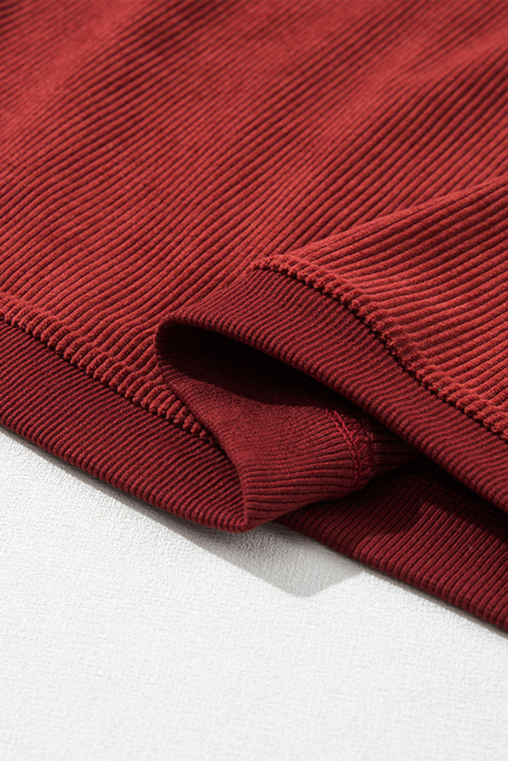 Orange ribbed corduroy oversized sweatshirt by Dear-Lover Dropshipping, featuring a relaxed fit and textured fabric.