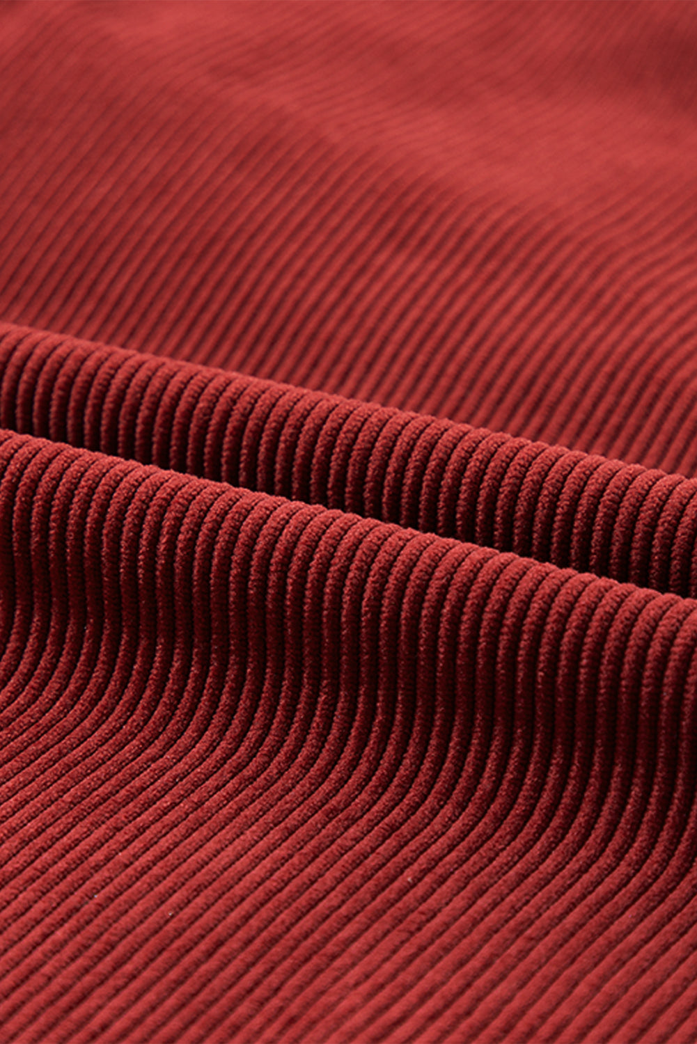 Orange ribbed corduroy oversized sweatshirt by Dear-Lover Dropshipping, featuring a relaxed fit and textured fabric.