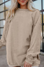 Orange ribbed corduroy oversized sweatshirt by Dear-Lover, featuring a cozy, relaxed fit in a soft polyester fabric.