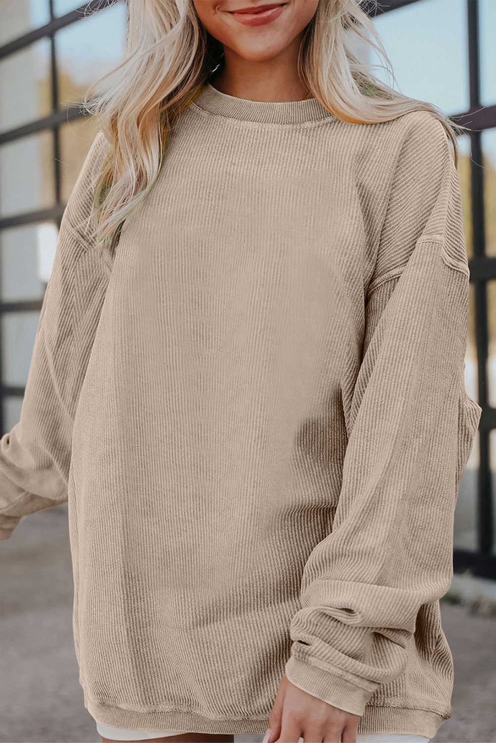 Orange ribbed corduroy oversized sweatshirt by Dear-Lover, featuring a cozy, relaxed fit in a soft polyester fabric.