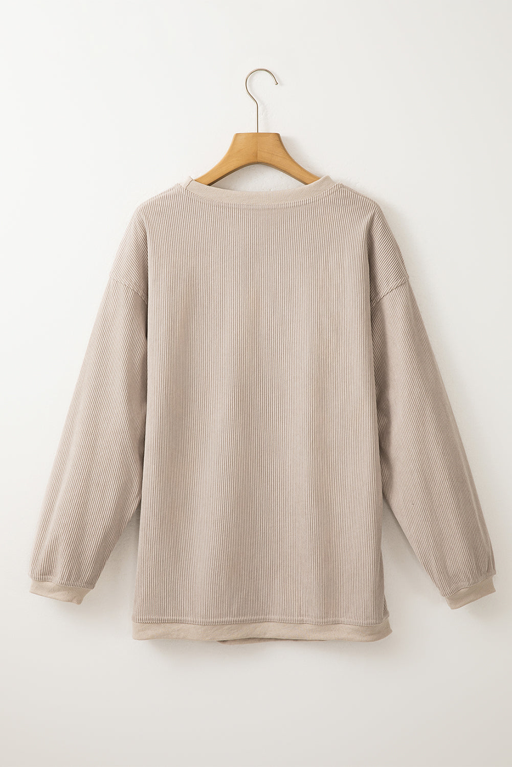 Orange ribbed corduroy oversized sweatshirt by Dear-Lover Dropshipping, showing the textured fabric and relaxed fit.