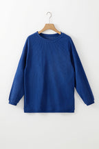 Orange ribbed corduroy oversized sweatshirt by Dear-Lover Dropshipping, featuring a relaxed fit and textured fabric.