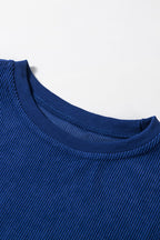 Orange ribbed corduroy oversized sweatshirt from Dear-Lover Dropshipping, featuring a cozy, relaxed fit and textured fabric.