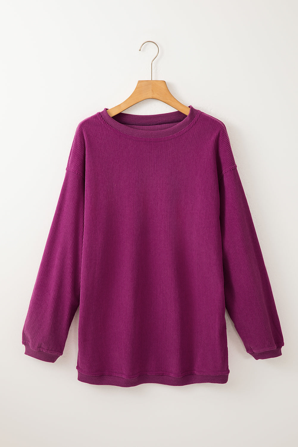 Orange ribbed corduroy oversized sweatshirt from Dear-Lover Dropshipping, featuring a cozy, relaxed fit and textured fabric.