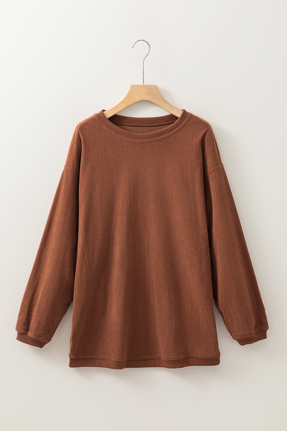 Orange ribbed corduroy oversized sweatshirt by Dear-Lover Dropshipping, featuring a cozy, textured fabric and relaxed fit.