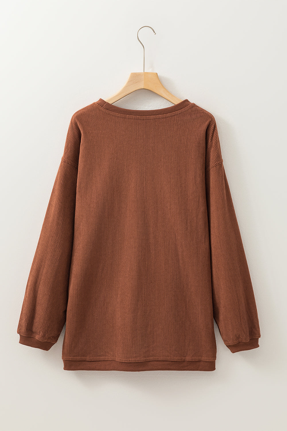 Orange ribbed corduroy oversized sweatshirt from Dear-Lover Dropshipping, featuring a relaxed fit and textured fabric.