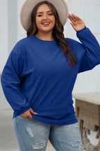 Orange ribbed corduroy oversized sweatshirt from Dear-Lover Dropshipping, featuring a cozy, relaxed fit and textured fabric.