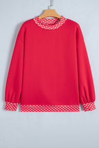 Orange colorblock polka dot oversized sweatshirt by Dear-Lover with contrast trim, made of polyester and cotton, casual top.
