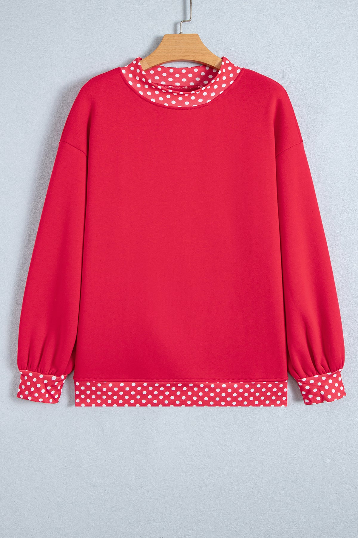 Orange colorblock polka dot oversized sweatshirt by Dear-Lover with contrast trim, made of polyester and cotton, casual top.