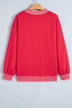 Orange colorblock polka dot oversized sweatshirt by Dear-Lover with contrast trim, made of polyester and cotton, cozy and stylish.