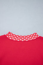 Orange colorblock polka dot oversized sweatshirt by Dear-Lover with contrast trim, made of polyester and cotton blend, casual top.
