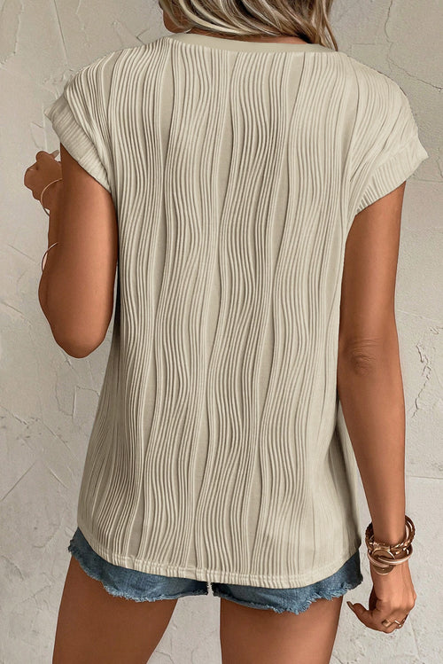 Apricot wavy textured V-neck tee by Dear-Lover Dropshipping, featuring button detail and stretchy polyester-elastane fabric.