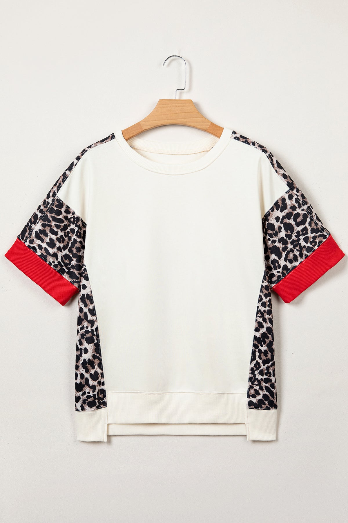 Beige leopard block patchwork short sleeve top from Dear-Lover with uneven hem and cotton-polyester blend fabric.