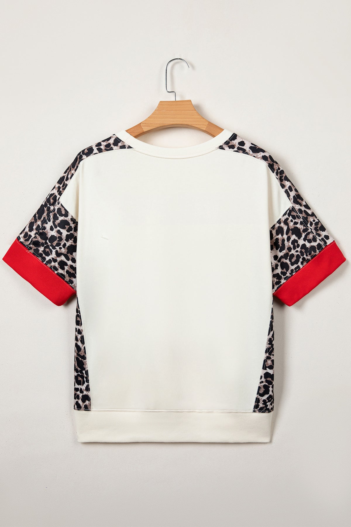 Beige leopard patchwork short sleeve top with uneven hem, made of cotton and polyester, by Dear-Lover Dropshipping.