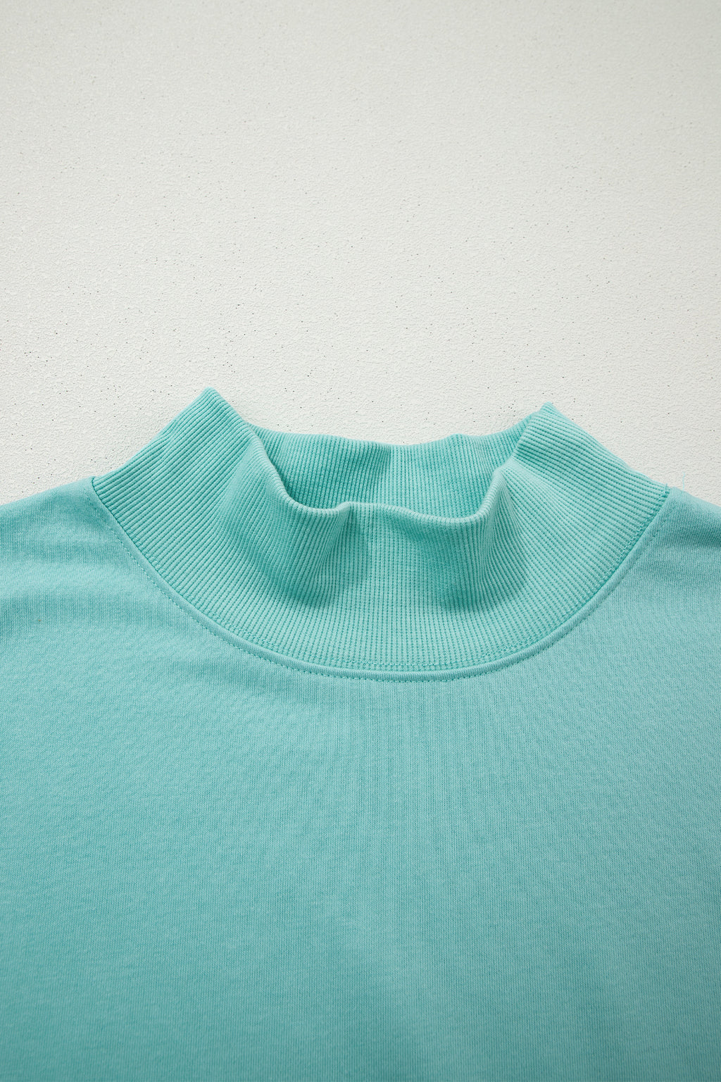 Black solid color high neck cap sleeve loose top by Dear-Lover, made of polyester and cotton, ideal for casual wear.