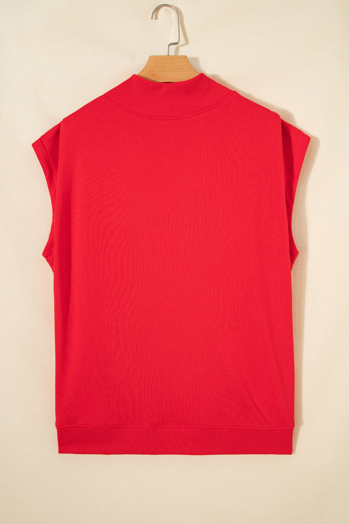 Black solid color high neck cap sleeve loose top by Dear-Lover, made of polyester and cotton, displayed on a hanger.