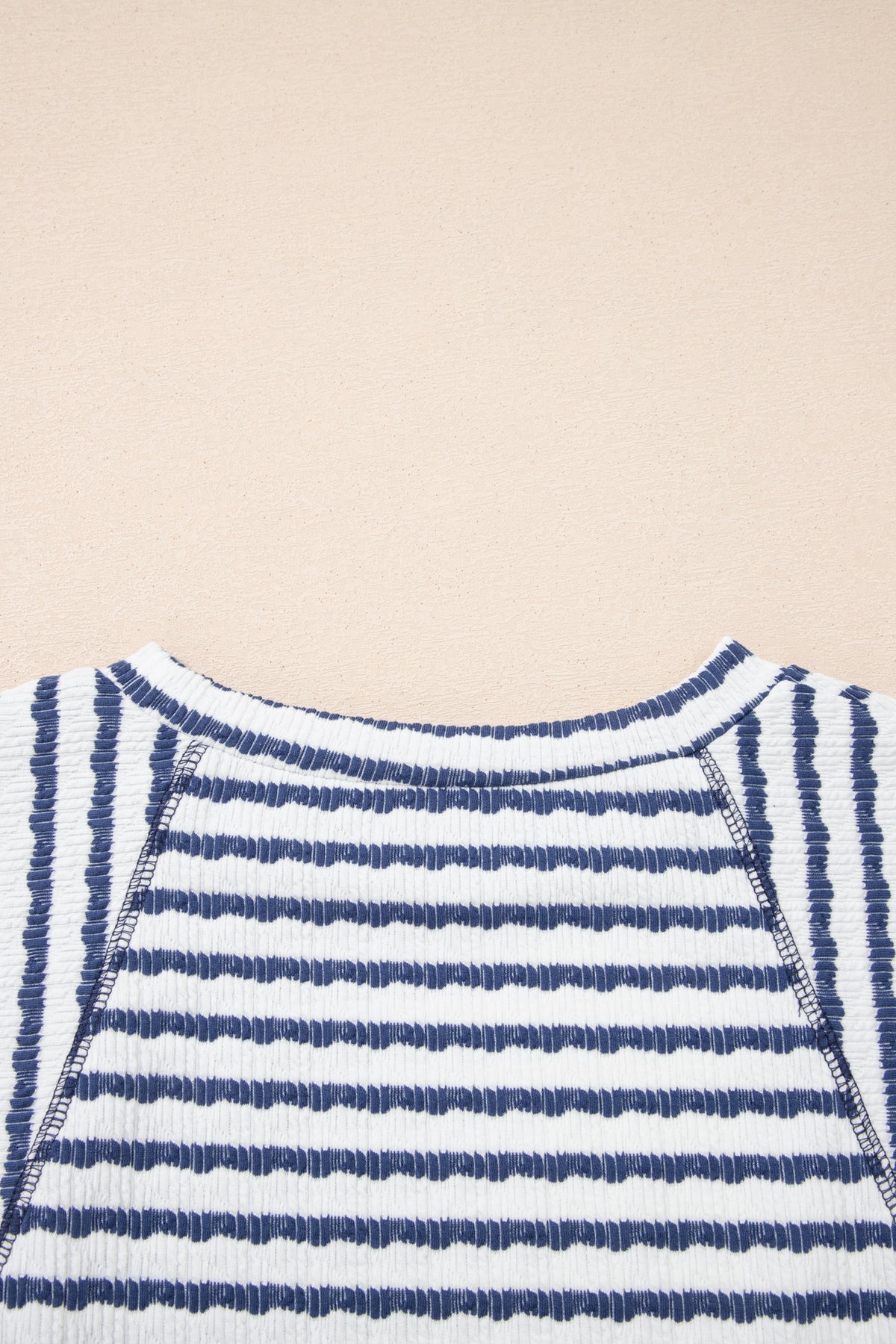 Pink striped textured knit half-sleeve loose top by Dear-Lover with split hem, ideal for casual wear, made from polyester, viscose, and elastane.