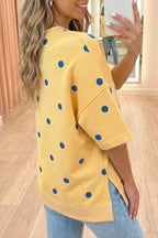 Yellow polka dot print oversized tee by Dear-Lover with crossed seam detail, made of polyester and elastane, casual top for women.